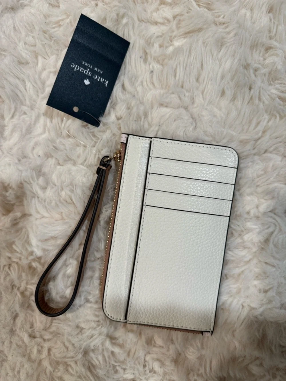 kate spade Pale Pink Pebbled Leather Wristlet with Tan Strap